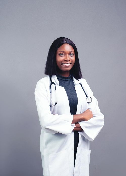 Professional yoga practitioner Sofia Kravchuk smiling in studio